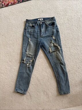 Distressed medium wash jeans